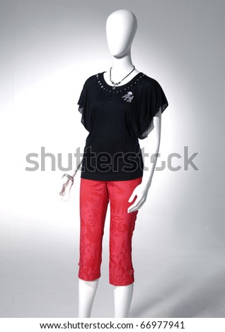Fashion collection of dress on mannequin in light background