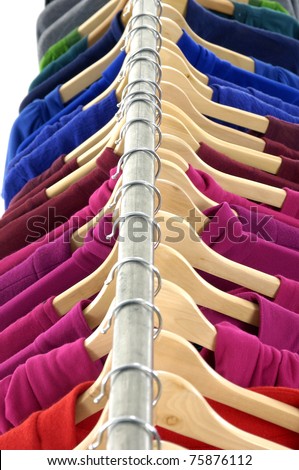 Top view colored Tee Shirts hanging