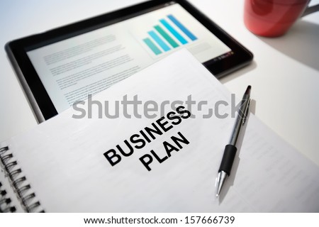 Business plan strategy with touchscreen presentation.
