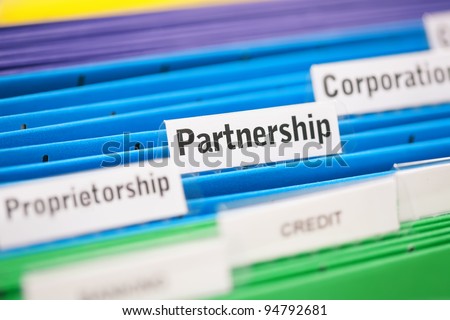 Partnership business entity filed in a blue folder