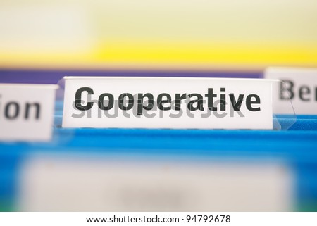 Cooperative business organization filed in blue folders