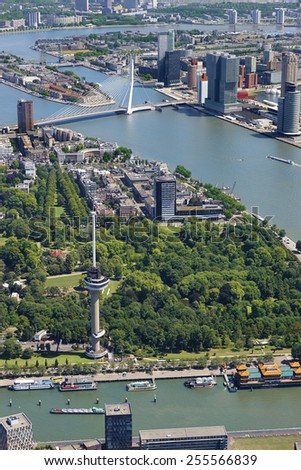 Aerial view of the city of Rotterdam with Euromast, Erasmus bridge, railway bridge and building De Rotterdam, the Netherlands.