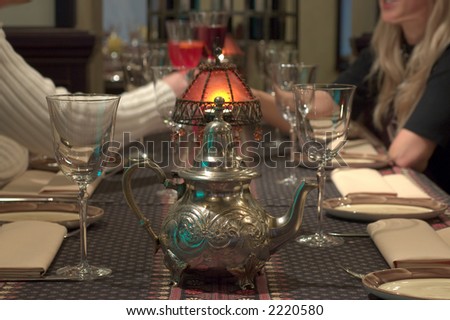 A couple meet in a restaurant drinking tea in a romantic atmosphere
