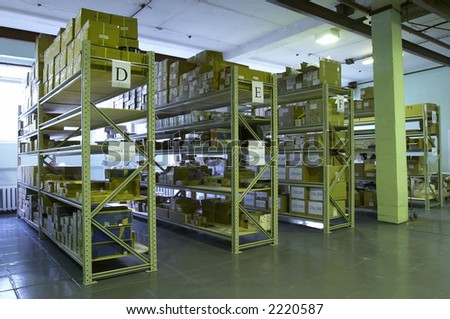 huge warehouse with boxes and other stuff