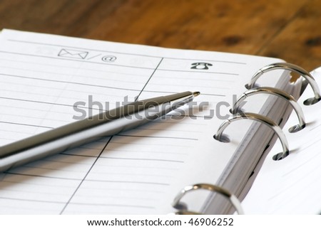 A pen and an address book