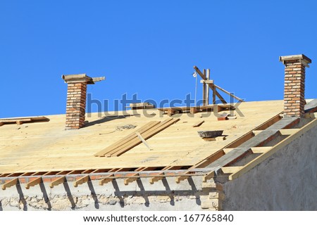 Roof under construction. Carpentry work