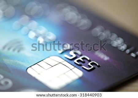 Low key macro shot with credit card.