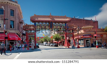 VICTORIA, BRITISH COLUMBIA, CANADA - JULY 7: The Victoria\'s Chinatown gate,  known as The Gates of Harmonious Interest shot on July 7, 2013 in Victoria, British Columbia, Canada.
