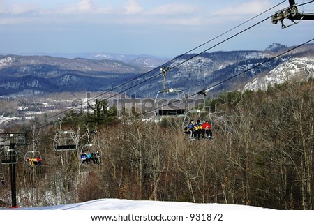 Ski Chair-Lift with Mountainous Background 2