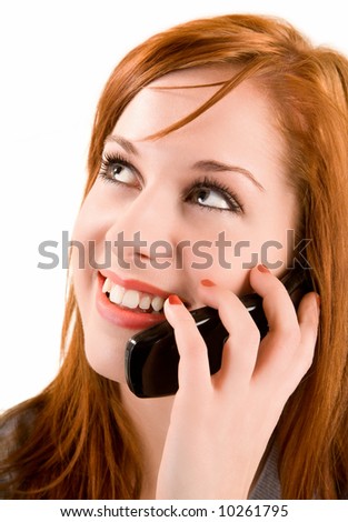 stock photo Beautiful Redhead Girl Talking to her Cellphone