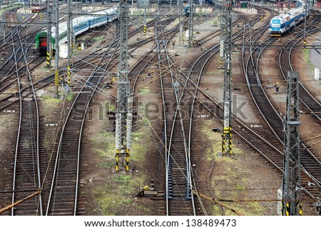 Railroad tracks line crossing. Train in motion Top view