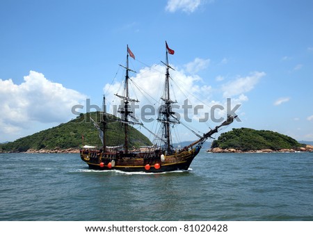 Historic old ship in the ocean near the islands