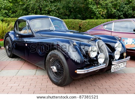 MOSCOW, RUSSIA - SEPT 24: A 1953 Jaguar XK120 Roadster in the final stage of the competition for classic cars at the 