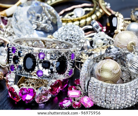 Many fashionable women's jewelry. Brilliant bangles
