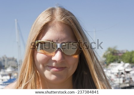 Young Woman Portrait - In front of the marina of Victoria, Vancouver Island, British Columbia, Canada