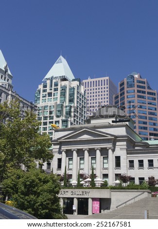 VANCOUVER, CANADA - AUGUST 5, 2005: Vancouver Art Gallery in front of Cathedral Place in Vancouver, Canada. The Vancouver Art Gallery is a neoclassical building, was designed by Francis Rattenbury.