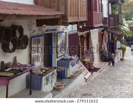 KAS, TURKEY - OCTOBER 15, 2009: Jewelry and carpet store in traditional town houses in the village Kas in Turkey. Kas is a small fishing, diving, yachting and tourist town in Antalya Province.