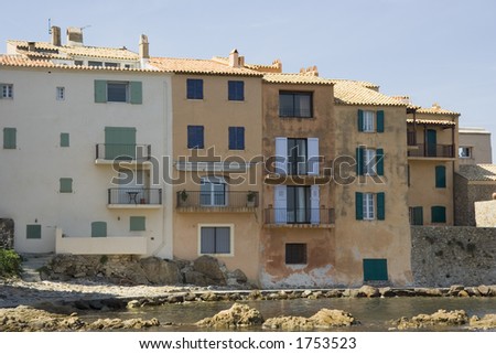 apartment houses in saint-tropez on the waterfront - danger of flood disaster - french riviera, mediterranean sea