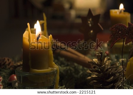 beeswax candles on an advent wreath - romantic lighting