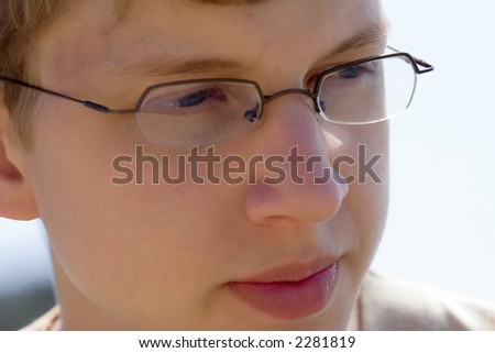 teen closeup - on vacation - shallow DOF, focus is on the left side of his face