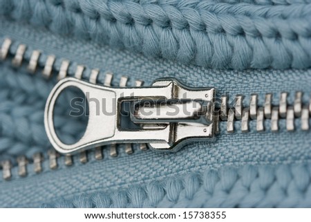 Close-up of an Open Zipper - part of a sweater