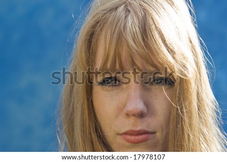 Portrait of a young woman - frowning
