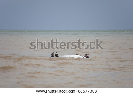 OLYMPOS, TURKEY - OCTOBER 14: Frogmen doing rescue work after flood disaster on October 14, 2009 in Olympos, Turkey, Asia. The floods swept away about 50 cars from the road into the sea.