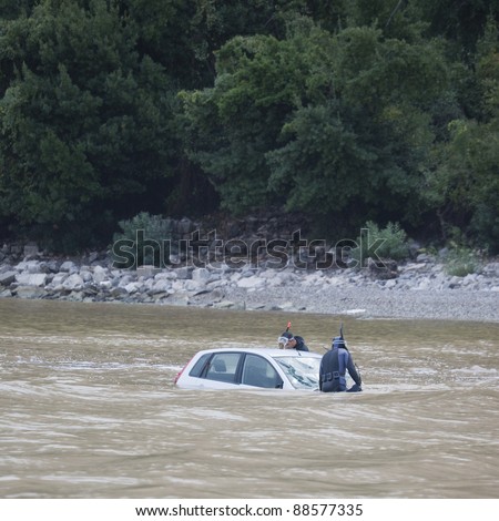 OLYMPOS, TURKEY - OCTOBER 14: Sunken car in mediterranean sea after flood disaster on October 14, 2009 in Olympos, Turkey, Asia. The floods swept away about 50 cars from the road into the sea.