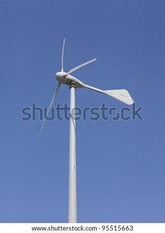 HERMIVAL LES VAUX, FRANCE - JUNE 29: Wind Turbine producing electricity for the zoo Cerza in Hermival les Vaux, France on June 29, 2011. The length of the wind turbine is 23m.