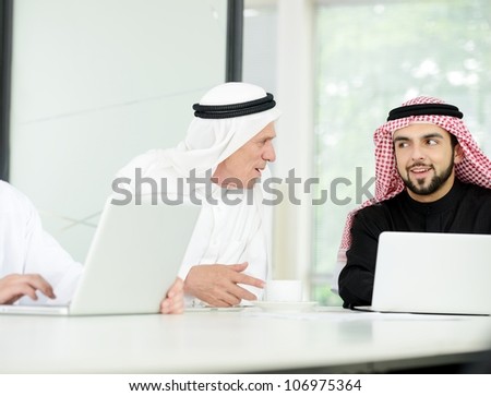 happy Saudi man at work