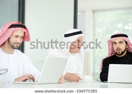 happy Saudi man at work