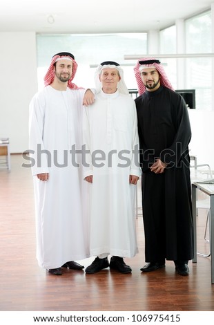 Happy smart business Arabic men standing in office at work
