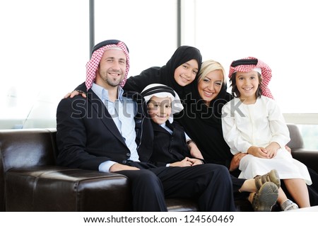 Arabic Muslim father and mother with sons daughter