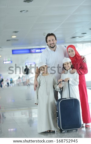 Young Arabic passengers traveling at the airport