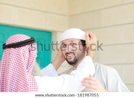 Gulf Arabic Muslim people posing