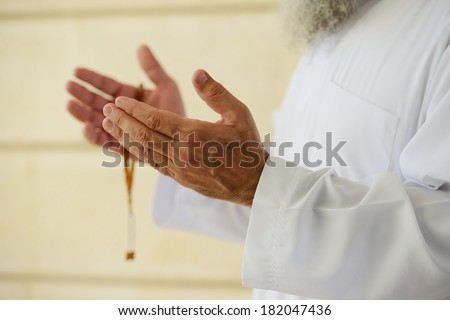 Middle eastern Arabic people praying