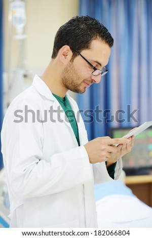 Lifestyle posing people working with tablet pc at modern hospital