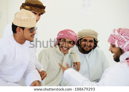 Gulf Arabic Muslim people posing