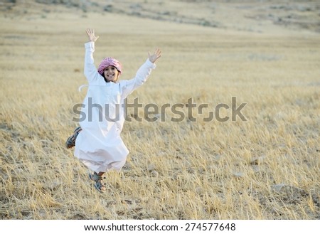 Arabic happy child in nature