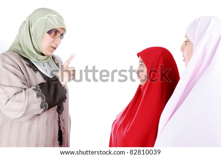 Teacher muslim with two girls, taking together