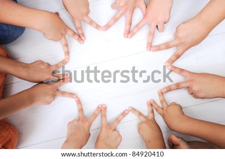 Children fingers, hands in circle, making a star