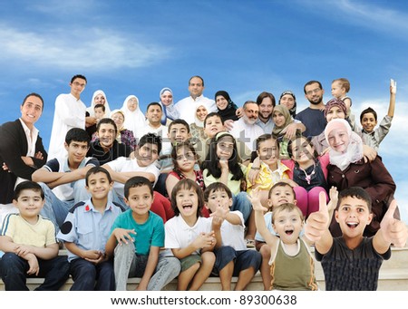 Arabic Muslim portrait of very big family group with many members, 3 generations