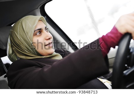 muslim woman in a car