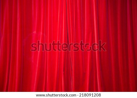 Red closed curtain in the theatre