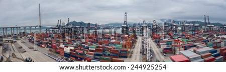 HONG KONG -March 9: Containers at Hong Kong commercial port on March 9,  2014 in Hong Kong, China. Hong Kong is one of several hub ports serving more than 240 million tonnes of cargo during the year.