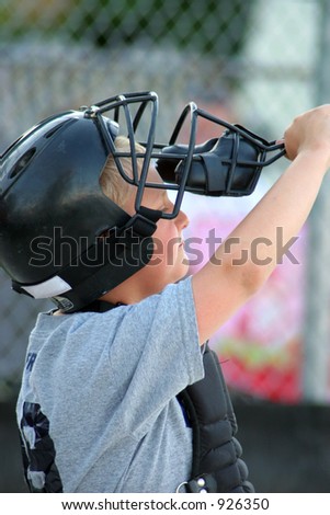 Boy catching baseball