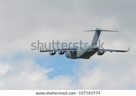 PRAGUE, CZECH REPUBLIC - JULY 9: RAF\'s military transport aircraft Boeing C-17A Globemaster made a stopover for refueling at the Prague International Airport on the 9th July 2012. Details of take-off.