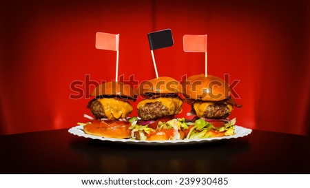 Three tasty mini burgers at the nice club restaurant