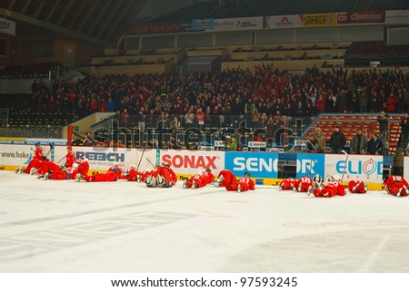 PRAGUE, CZECH REPUBLIC - MAY 7: Winning team thanking the audience after final match of university league between of Charles University (red) and VSE (white) on May 7, 2012 in Prague, Czech Republic.