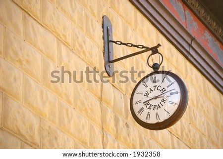 Vintage clock repair sign in American West